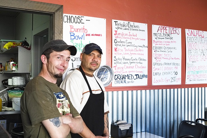 Little Chicken Spot owner Rick Gonzalez (right) and chef James Wright offer chicken based dishes six days a week in Williams. (Loretta Yerian/WGCN)