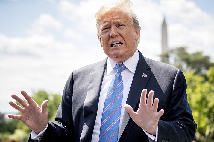 President Donald Trump speaks to members of the media on the South Lawn of the White House in Washington, Tuesday, May 14, 2019, before boarding Marine One for a short trip to Andrews Air Force Base, Md., to travel to Louisiana. (Andrew Harnik/AP)