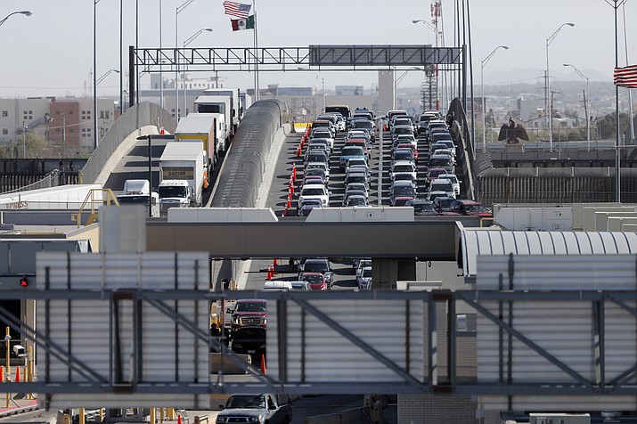 Cars and trucks line up to enter the U.S. from Mexico on March 29, 2019, at a border crossing in El Paso, Texas. (Gerald Herbert/AP)