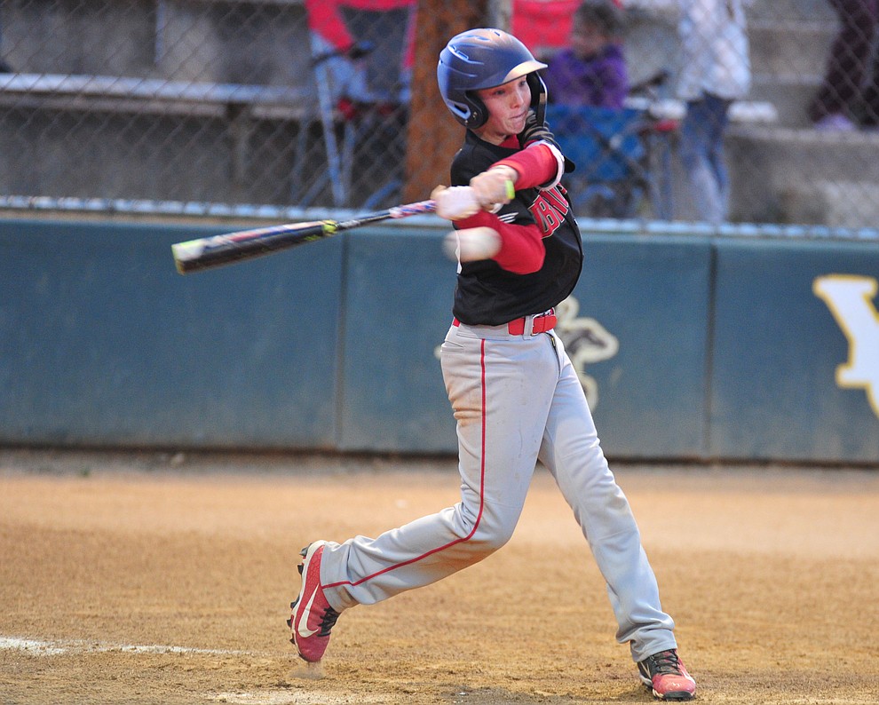Adrian Sanderford singles as Farmers Insurance faced off against the True Value in the Prescott Little League Majors City Championship Game Friday, May 17. (Les Stukenberg/Courier)
