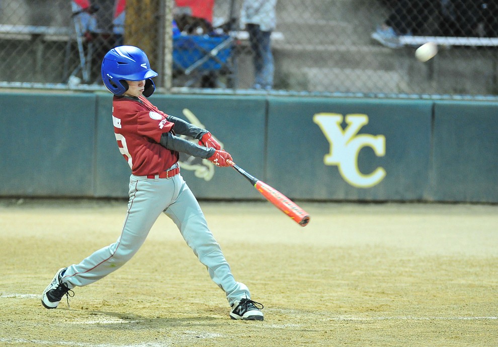 Colton Champion makes contact as Farmers Insurance faced off against the True Vaue in the Prescott Little League Majors City Championship Game Friday, May 17. (Les Stukenberg/Courier)