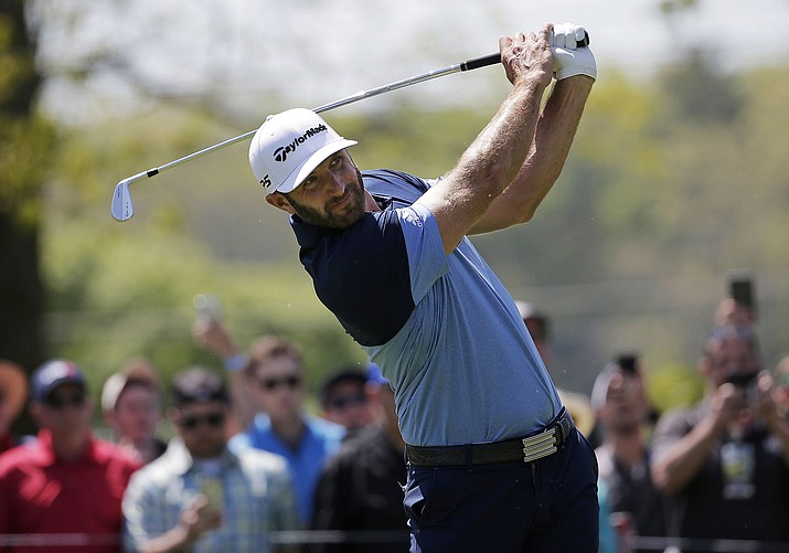 Dustin Johnson, drives off the sixth tee, during the third round of the PGA Championship, Saturday, May 18, 2019, at Bethpage Black in Farmingdale, N.Y. (Seth Wenig/AP)