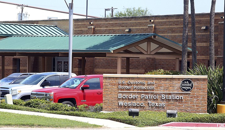 This May 20, 2019 photo shows the Border Patrol Station in Weslaco, Texas. The U.S. government says a 16-year-old from Guatemala died at the Border Patrol station, becoming the fifth death of a migrant child since December. U.S. Customs and Border Protection said in a statement that Border Patrol apprehended the teenager in South Texas Rio Grande Valley on May 13. The agency says the teenager was found unresponsive Monday morning during a welfare check. (Joel Martinez/The Monitor via AP)
