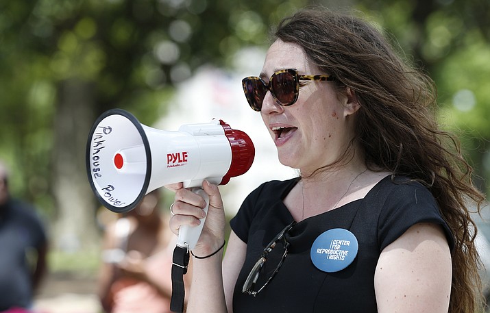 Hillary Schneller, an attorney with the Center For Reproductive Rights, addresses abortion rights advocates, Tuesday, May 21, 2019, at the Capitol in Jackson, Miss., as they rally to voice their opposition to state legislatures passing abortion bans. (Rogelio V. Solis/AP)