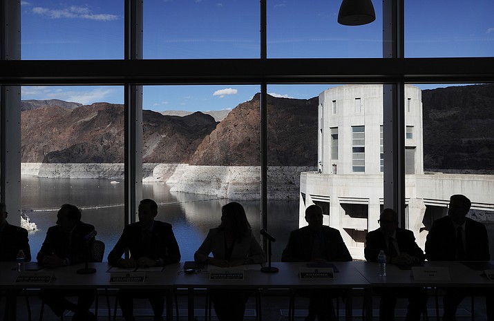 Representatives from seven states and the federal government sit during a news conference at Hoover Dam before a ceremony for a Colorado River drought contingency plan, Monday, May 20, 2019, in Boulder City, Nev. (John Locher/AP)
