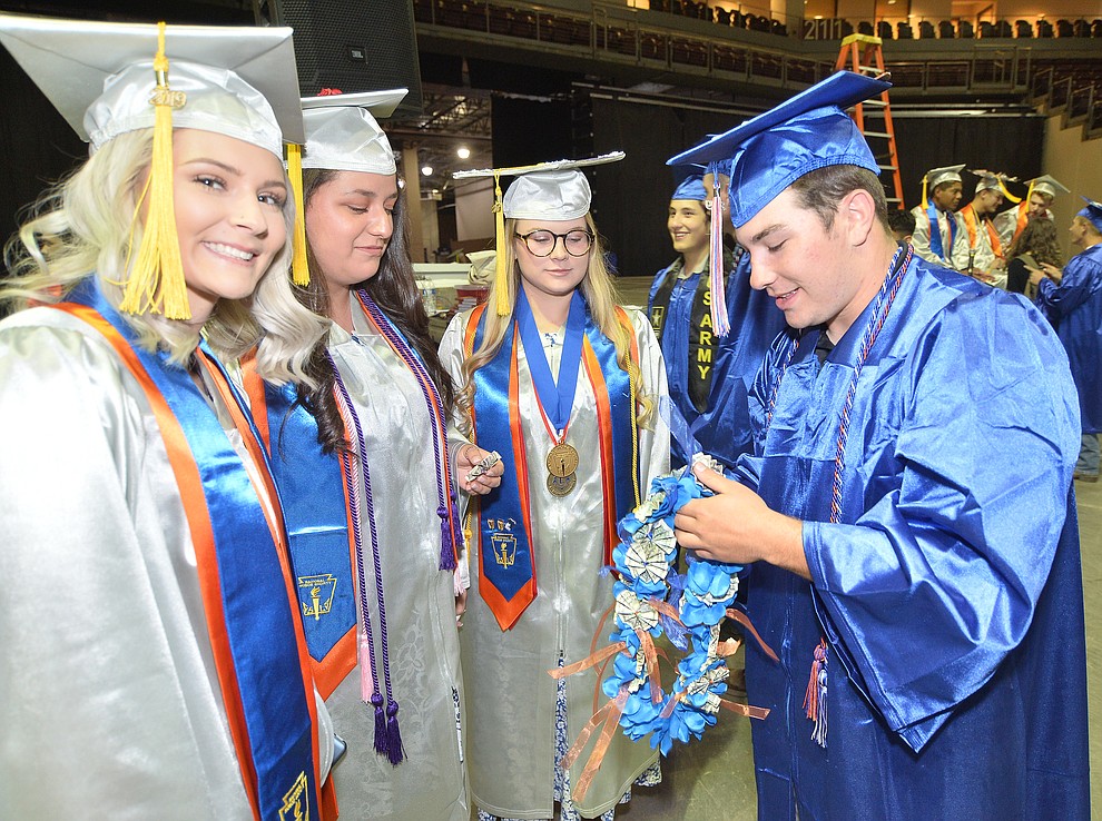 Jadyn Clawson, Marycarmen Olguin, Rebecca Ballard and Michael Paulus before Chino Valley HIgh School graduated 153 students in a commencement ceremony Wednesday, May 22 at the Findlay Toyota Center in Prescott Valley. (Les Stukenberg/Courier)