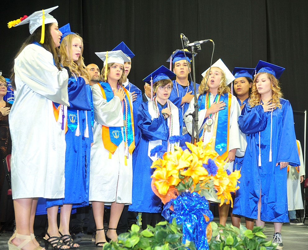 Chino Valley HIgh School Choir sings the National Anthem as the high school graduated 153 students in a commencement ceremony Wednesday, May 22 at the Findlay Toyota Center in Prescott Valley. Look for a photo gallery online at www.dcourier.com. (Les Stukenberg/Courier)