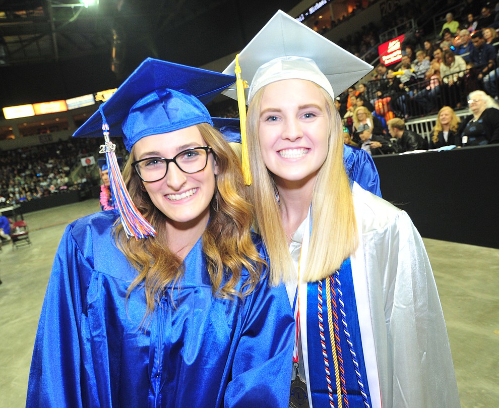 Remy Athelli and Phoebe Dunn wait for their diplomas Chino Valley HIgh School graduated 153 students in a commencement ceremony Wednesday, May 22 at the Findlay Toyota Center in Prescott Valley. (Les Stukenberg/Courier)