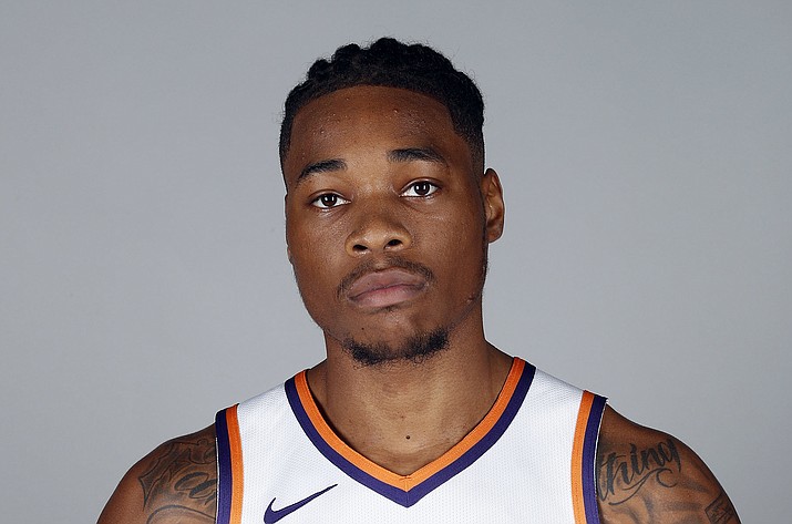 In this Sept. 24, 2018, photo, Phoenix Suns’ Richaun Holmes poses for a photograph during media day at the NBA basketball team’s practice facility in Phoenix. Phoenix Suns big man Richaun Holmes was arrested for misdemeanor possession of cannabis after a Miami-area traffic stop. Twenty-five-year-old Holmes was arrested Tuesday night, May 22, 2019, along with former Brooklyn Nets forward James Webb III after authorities say the found a recently used marijuana joint inside their vehicle. (Matt York/AP, file)
