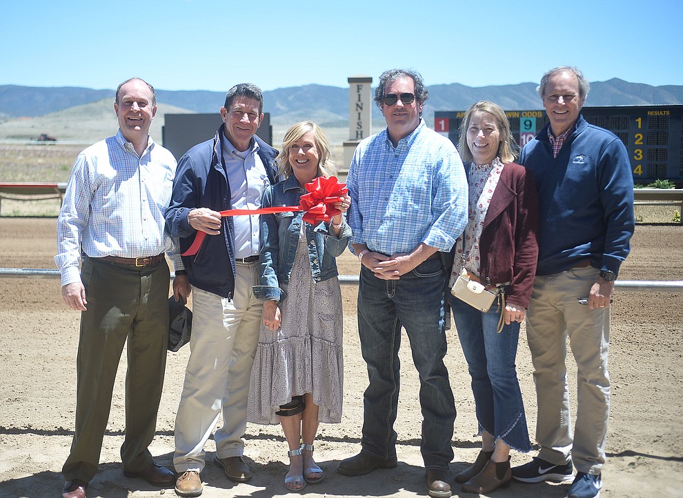 The ownership group, from left, Dave Auther, Joe and Lynne Jackson, Tom Auther and Mike and Tammy Auther at opening day of Arizona Downs Friday, May 24 in Prescott Valley. The racetrack reopens under new ownership after being closed for 10 years. (Les Stukenberg/Courier)