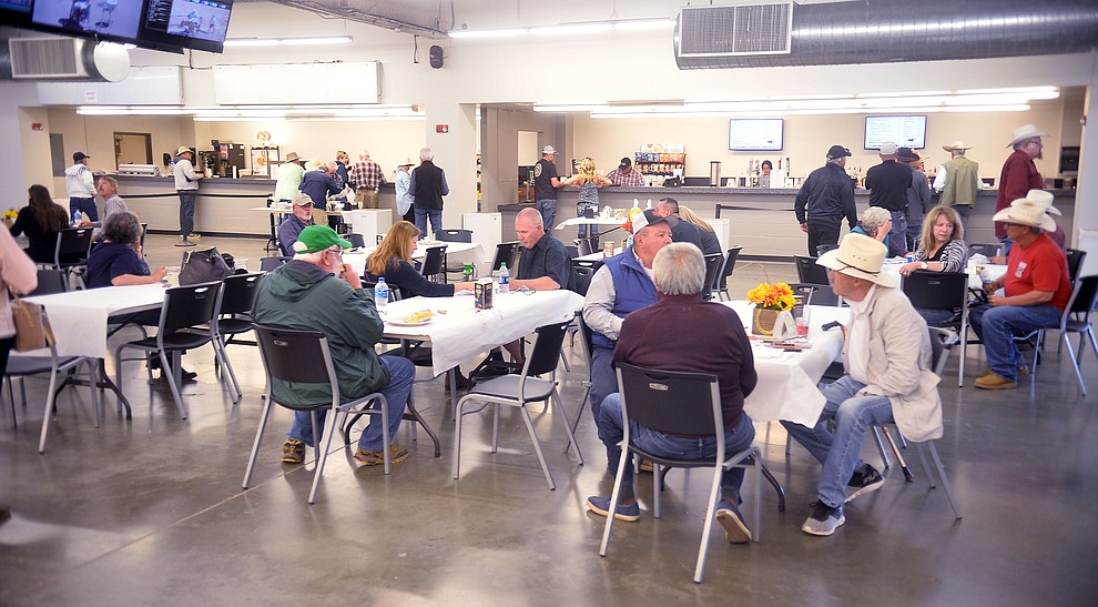 People enjoy the food at opening day of Arizona Downs Friday, May 24 in Prescott Valley. The racetrack reopens under new ownership after being closed for 10 years. (Les Stukenberg/Courier)