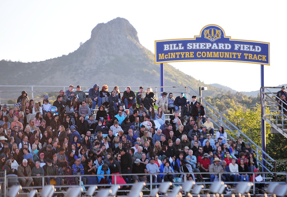 Thumb Butte stands majestic as Prescott High School graduated 301 students in a commencement ceremony Friday, May 24 on Bill Shepard Field in Prescott. (Les Stukenberg/Courier)