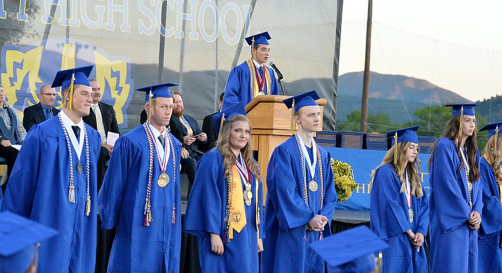 Colton Amos speaks for the Graduates with Distinction as Prescott High School graduated 301 students in a commencement ceremony Friday, May 24 on Bill Shepard Field in Prescott. (Les Stukenberg/Courier)