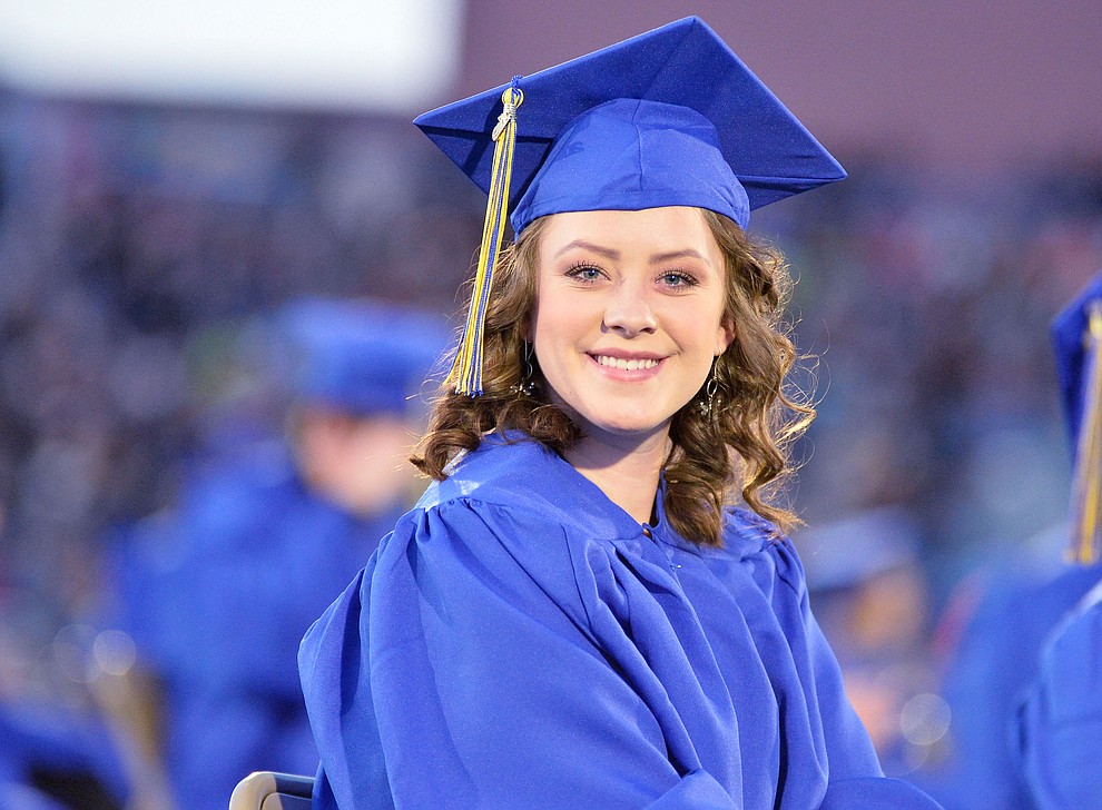Hannah Steinbrink is all smiles as Prescott High School graduated 301 students in a commencement ceremony Friday, May 24 on Bill Shepard Field in Prescott. (Les Stukenberg/Courier)