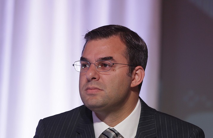 U.S. Rep. Justin Amash, R-Mich., is seen during a congressional panel at the 2016 Mackinac Republican Leadership Conference, Saturday, Sept. 19, 2015, in Mackinac Island, Mich. (AP Photo/Carlos Osorio)