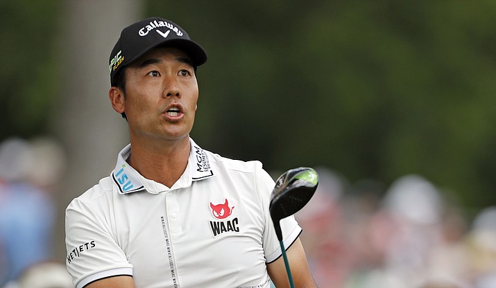 Kevin Na watches his shot from the third tee during the third round of the Charles Schwab Challenge at Colonial Country Club in Fort Worth, Texas, Saturday, May 25, 2019. (Bob Booth/Star-Telegram via AP)