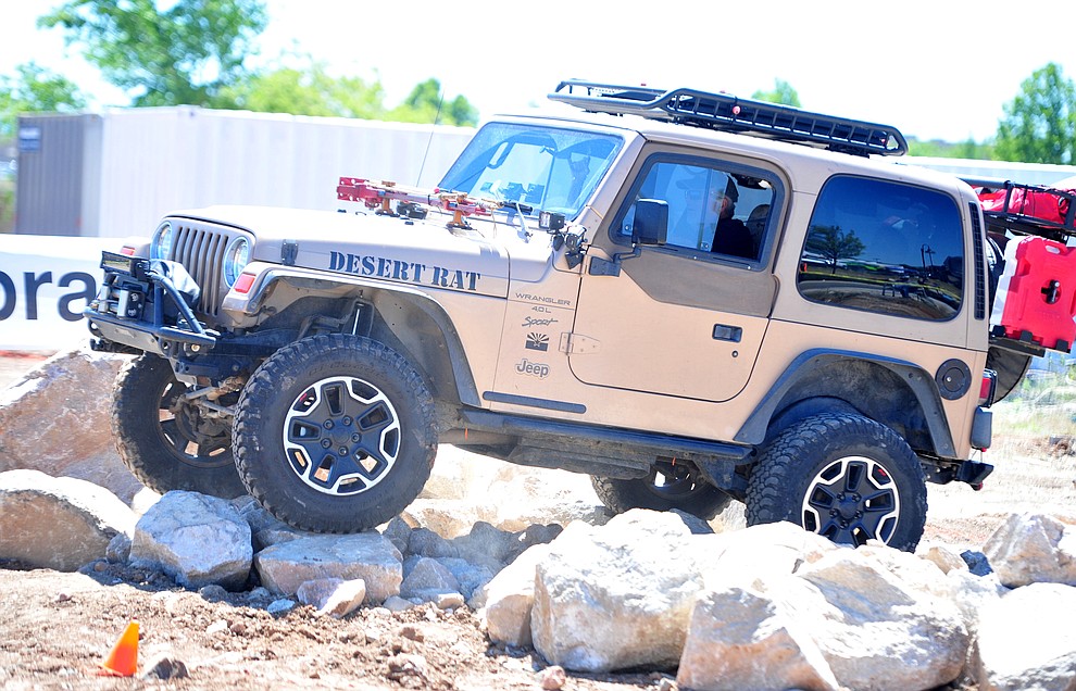Four-wheel drive vehicles took to an obstacle course during Arizona Off Road Promotion's Prescott Valley Grand Prix near the Findlay Toyota Center Saturday, May 25. in Prescott Valley. (Les Stukenberg/Courier)