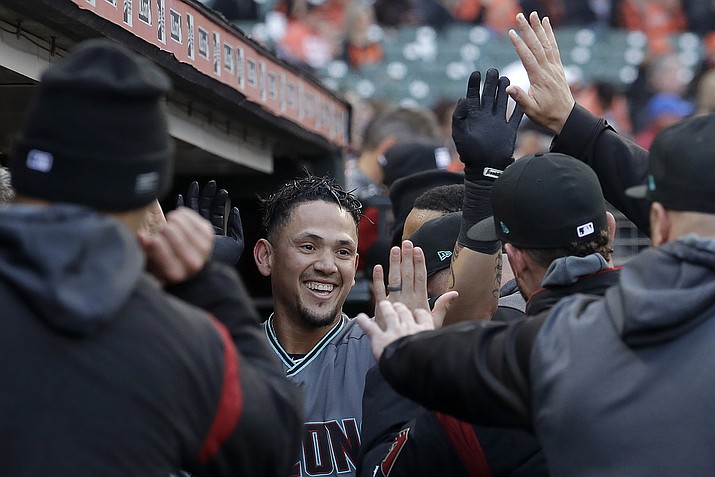 Arizona Diamondbacks’ Ildemaro Vargas, center, is congratulated by teammates after hitting a solo home run against the San Francisco Giants during the first inning in San Francisco, Friday, May 24, 2019. (Jeff Chiu/AP)