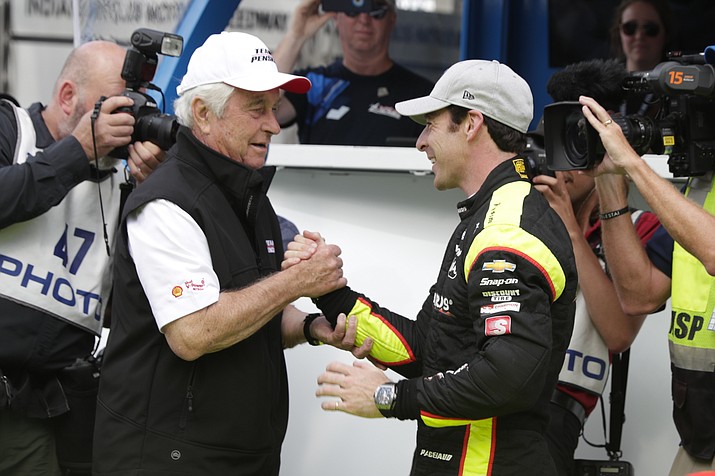 Simon Pagenaud of France is congratulated by car owner Roger Penske after winning the pole during qualifying for the Indianapolis 500 at Indianapolis Motor Speedway, Sunday, May 19, 2019, in Indianapolis. (Michael Conroy/AP)