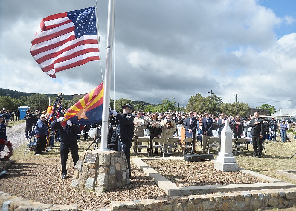 The flag is raised during the Memorial Day Ceremony at the Citizens Cemetery Monday, May 27 in Prescott. (Les Stukenberg/Courier)