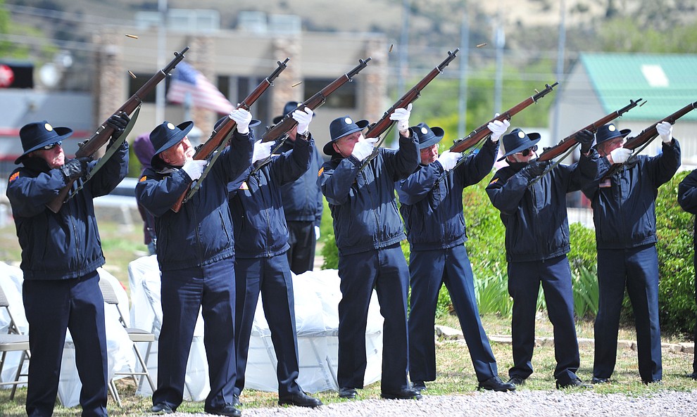 American Legion Post 6 Honor Guard fires a rifle volley during the Memorial Day Ceremony at the Citizens Cemetery Monday, May 27 in Prescott. (Les Stukenberg/Courier)
