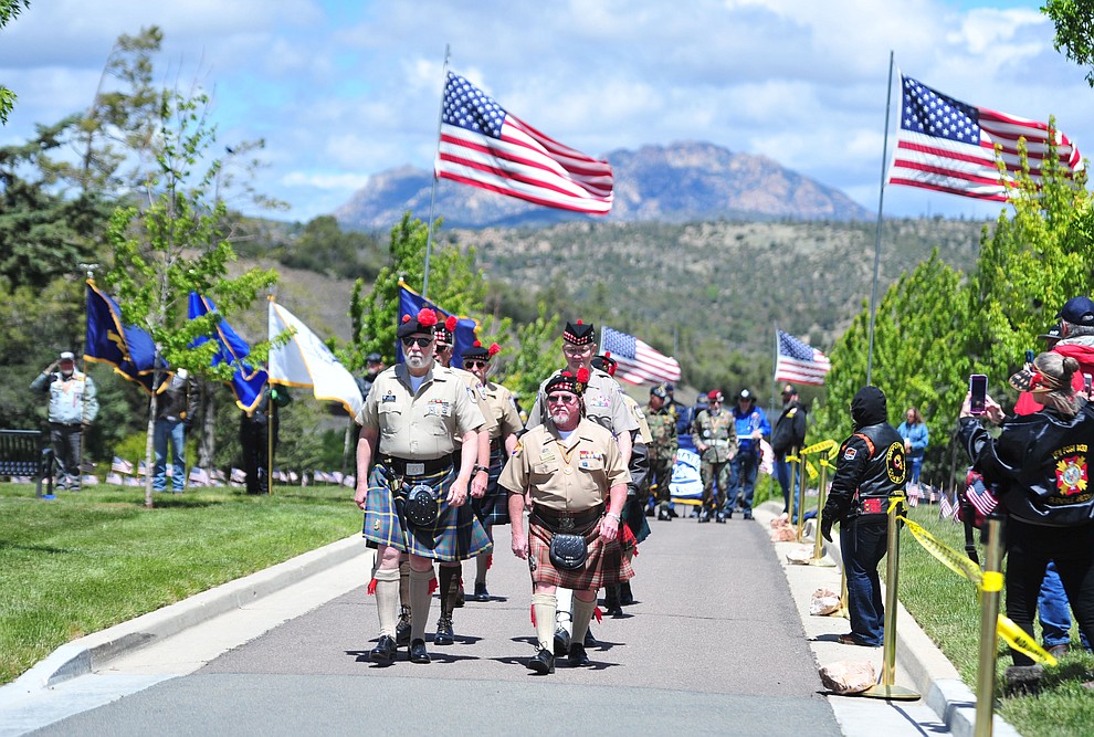 Members of the Scottish American Military Society march in the processional during the Memorial Day Ceremony at the National Cemetery Monday, May 27 in Prescott. (Les Stukenberg/Courier)