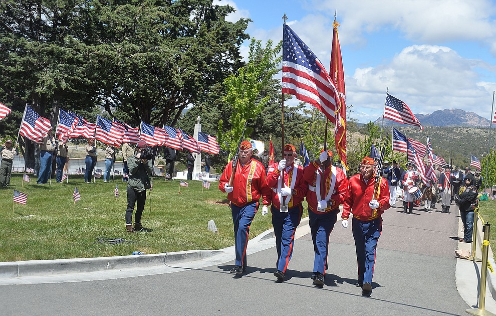 The Marine Corps League Color Guard marches in the processional during the Memorial Day Ceremony at the National Cemetery Monday, May 27 in Prescott. (Les Stukenberg/Courier)