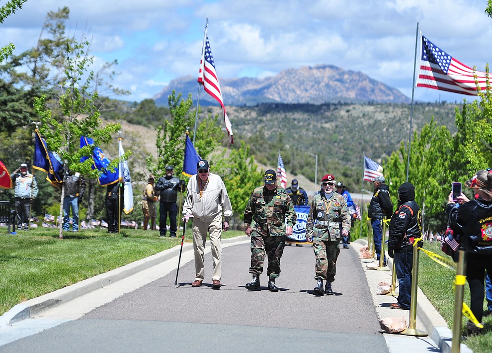 Members of the Northern Arizona All Airborne march in the processional during the Memorial Day Ceremony at the National Cemetery Monday, May 27 in Prescott. (Les Stukenberg/Courier)