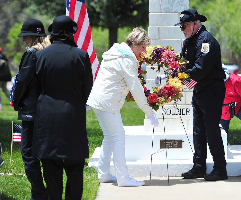 American Gold Star Mothers present a wreath at the Unknown Soldier monument during the Memorial Day Ceremony at the National Cemetery Monday, May 27 in Prescott. (Les Stukenberg/Courier)