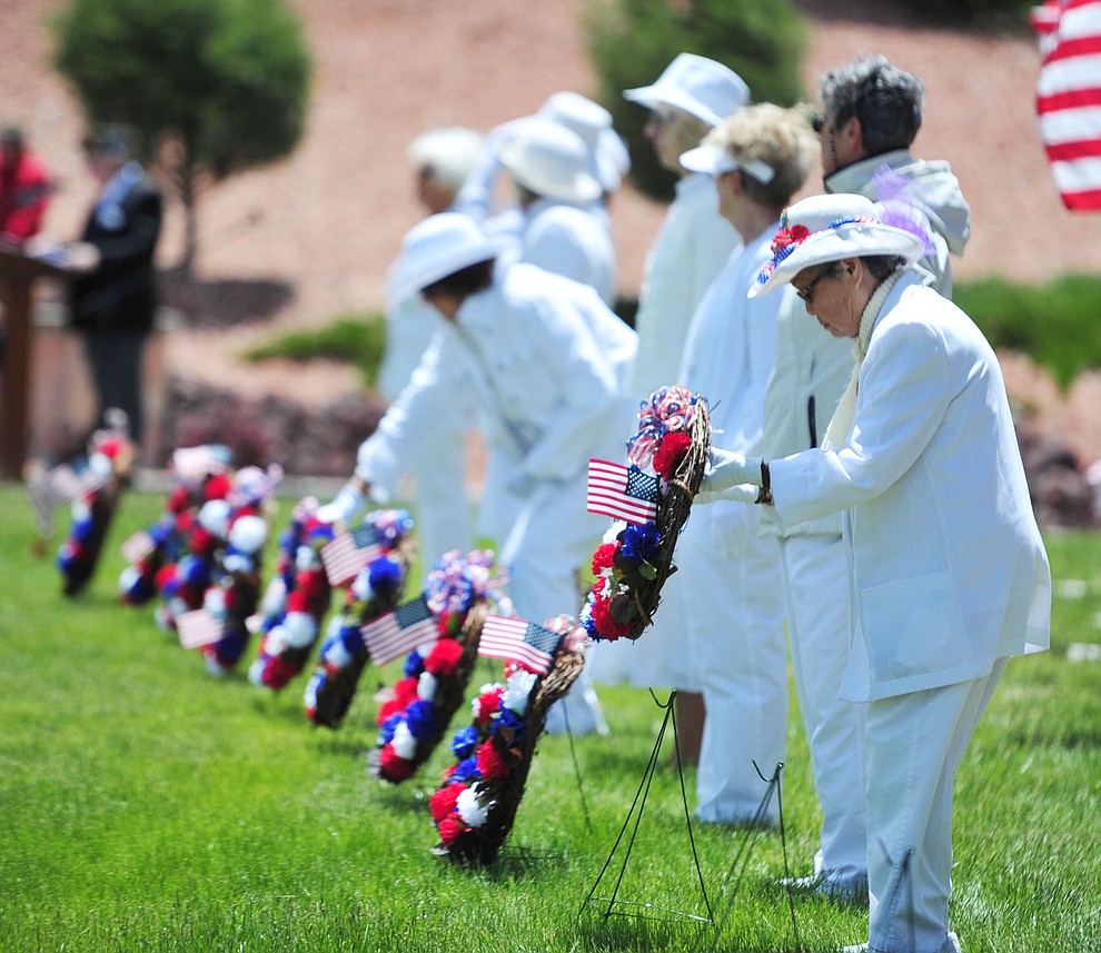 Members of various military fraternal organizations present wreaths in an Aisle of Honor during the Memorial Day Ceremony at the National Cemetery Monday, May 27 in Prescott. (Les Stukenberg/Courier)