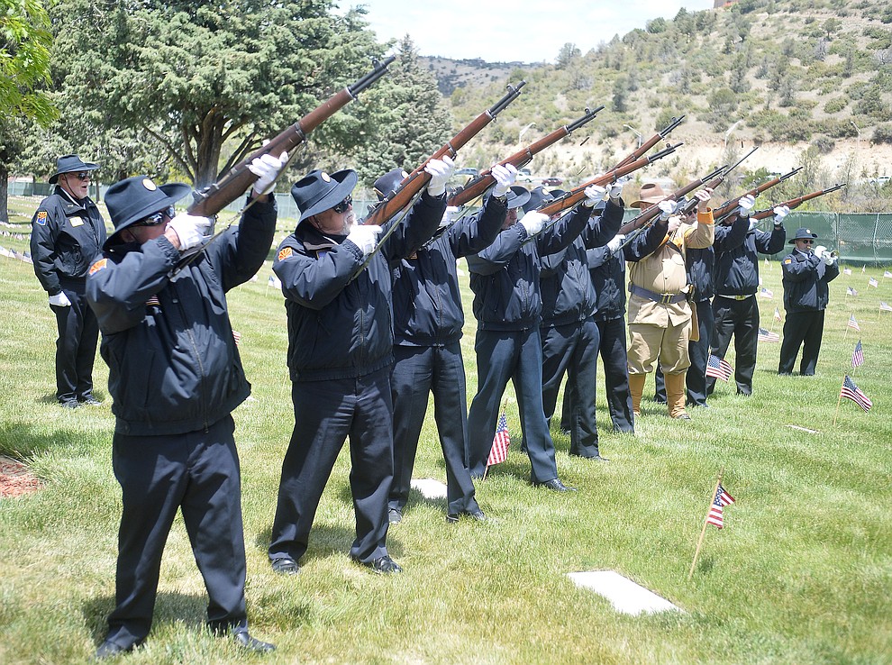 Members of the American Legion Post 6 Honor Guard and Arizona Roughriders fire a volley during the Memorial Day Ceremony at the National Cemetery Monday, May 27 in Prescott. (Les Stukenberg/Courier)