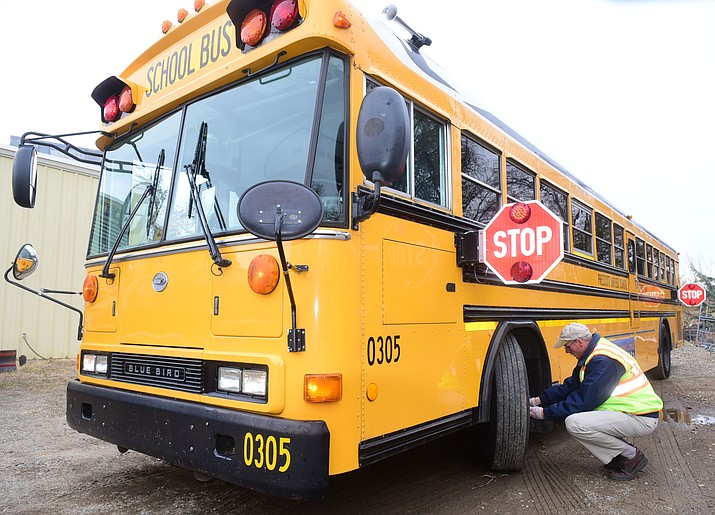 The Prescott Unified School District is changing its bus protocols along with school start and finish times for the coming school year. The reason: to enhance safety and answer a bus driver shortage. (Les Stukenberg/Courier, file)