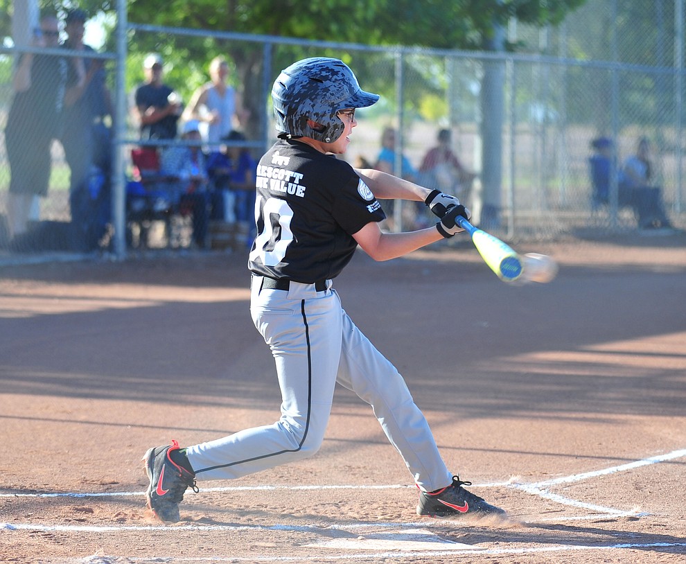 Prescott's Mike Falick makes contact against Prescott Valley at the Little League Tournament of Champions in Chino Valley Saturday May 31. (Les Stukenberg/Courier)