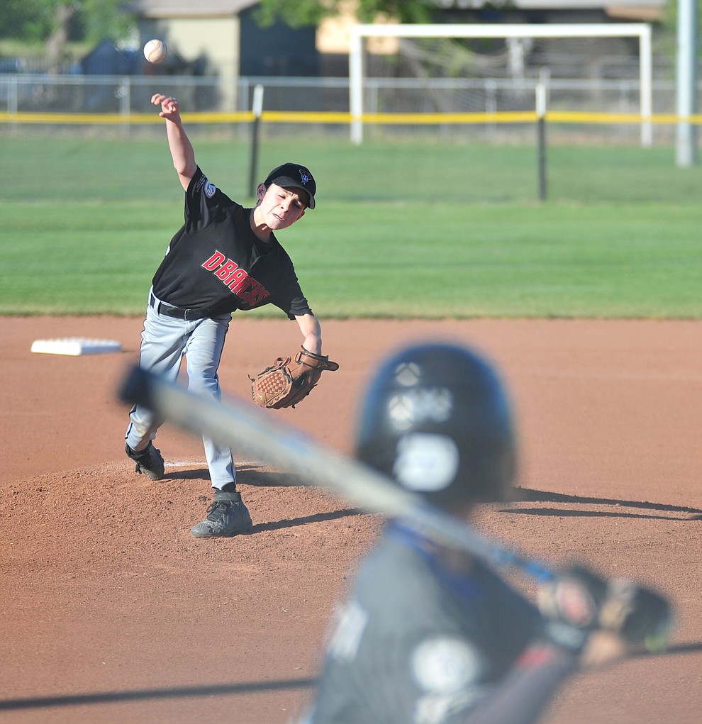 Prescott's Jake Diener delivers a pitch at the Little League Tournament of Champions in Chino Valley Saturday May 31. (Les Stukenberg/Courier)