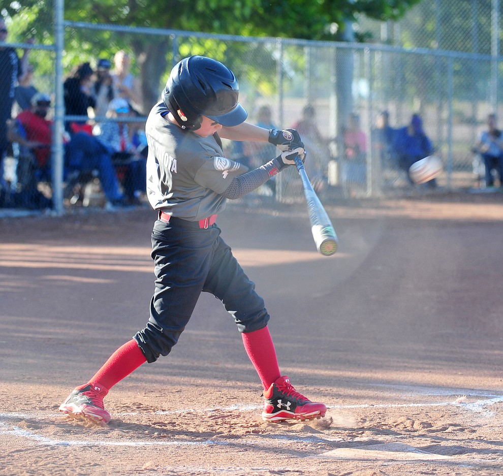 Prescott Valley's Trevor Field hits a triple against Prescott at the Little League Tournament of Champions in Chino Valley Saturday May 31. (Les Stukenberg/Courier)