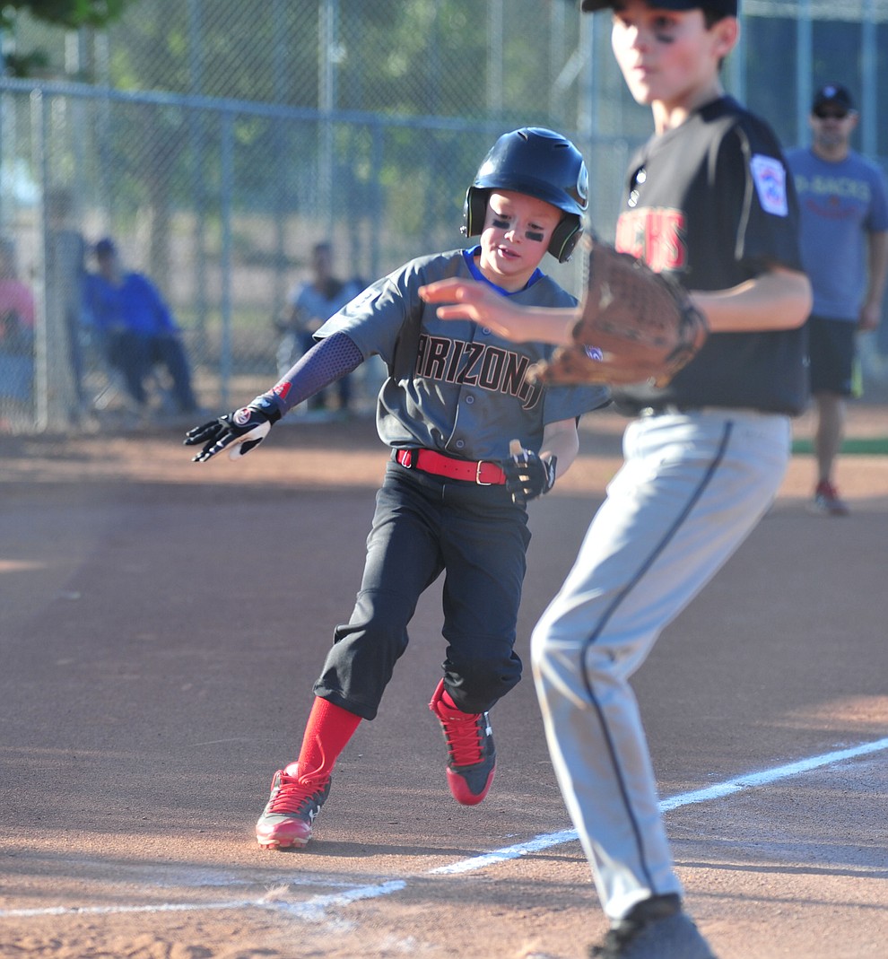 Prescott Valley's Trevor Field scores against Prescott at the Little League Tournament of Champions in Chino Valley Saturday May 31. (Les Stukenberg/Courier)