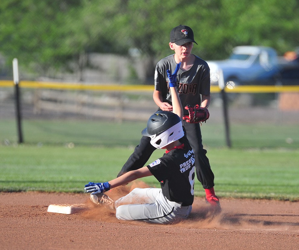 Prescott Valley's Colter Smith gets the force on a Prescott's Caden Bernier at the Little League Tournament of Champions in Chino Valley Saturday May 31. (Les Stukenberg/Courier)