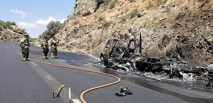 Firefighters with Sedona and Copper Canyon districts, as well as US Forest Service, respond Saturday on I-17 northbound at milepost 301 to a motor home and tow vehicle “fully involved with fire,” according to David Rodriguez, captain with the Sedona Fire District. (Photos courtesy Mike Loza/Copper Canyon Fire and Medical District)
