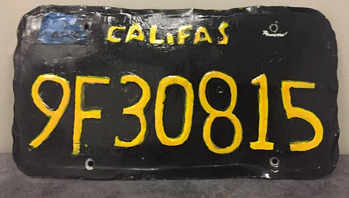 A big-rig truck driver in California was caught using a 1960s-style yellow-on-black license plate with wobbly letters and numbers. Also, instead of “CALIFORNIA,” it read “CALIFAS.” (Ventura County Sheriff’s Department)