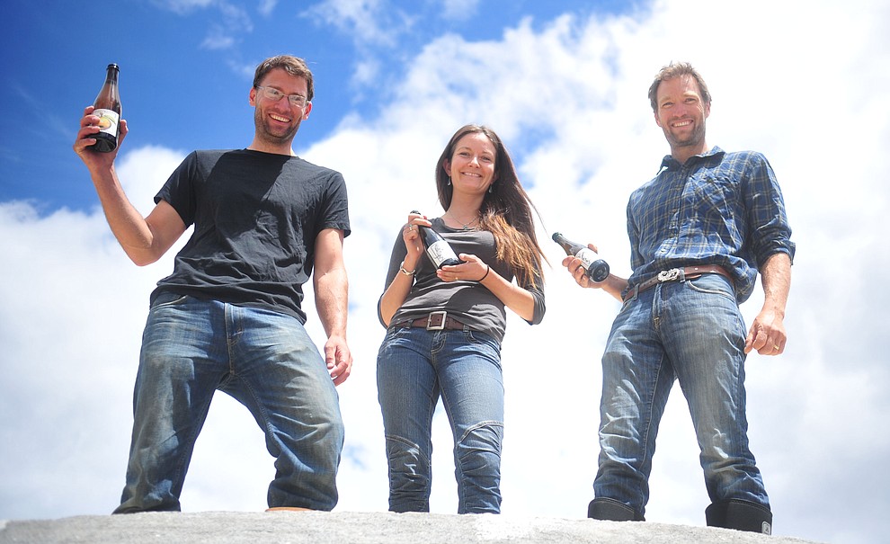 Cody, Tierney and Kanin Routson at the Stoic Cider orchard and bottling facility Tuesday, May 29 in Williamson Valley northwest of Prescott. (Les Stukenberg/Courier)