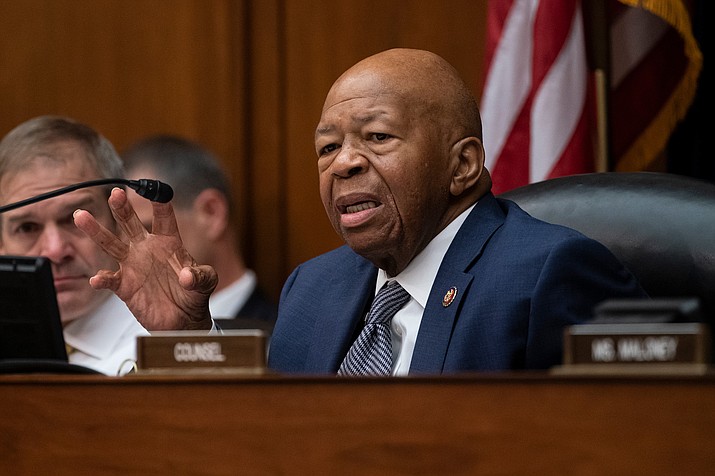 House Oversight and Reform Committee Chairman Elijah E. Cummings, D-Md., joined at left by Rep. Jim Jordan, R-Ohio, the ranking member, considers whether to hold Attorney General William Barr and Commerce Secretary Wilbur Ross in contempt for failing to turn over subpoenaed documents related to the Trump administration’s decision to add a citizenship question to the 2020 census, on Capitol Hill in Washington, Wednesday. (Scott Applewhite/AP)