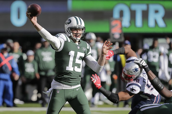 In this Nov. 25, 2018, photo, New York Jets quarterback Josh McCown (15) throws a pass during the first half of an NFL football game against the New England Patriots, in East Rutherford, N.J. McCown has announced he is retiring from playing football after an NFL career that spanned 16 NFL seasons and included stints with 10 teams. (Seth Wenig/AP, File)