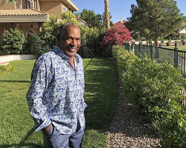 This Monday, June 3, 2019 photo provided by Didier J. Fabien shows O.J. Simpson in the garden of his Las Vegas area home. Simpson has launched a Twitter account with a video post in which the former football star says he’s got a “little gettin’ even to do.” Simpson confirmed the new account to The Associated Press on Saturday, June 15, 2019. He said in a phone interview it will be a lot of fun and that he had some things to straighten out. (Didier J. Fabien via AP, File)