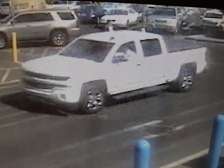 Yavapai County Sheriff’s Office detectives on June 19 released photos of video surveillance of the suspect’s vehicle involved in an alleged scam attempt on an elderly couple from Dewey. The vehicle was described as a white half-ton, four-door 2018 Chevy Silverado pickup truck with a black vinyl bed cover and running boards. (YCSO/Courtesy)