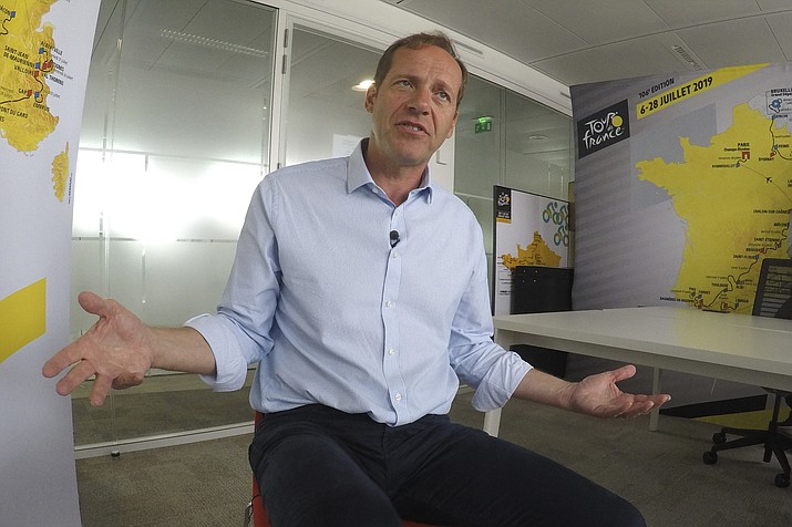 Tour de France director Christian Prudhomme answers the Associated Press in Paris, Wednesday, June 19, 2019. The director of the Tour de France is talking up the chances of 22-year-old phenomenon Egan Bernal springing an upset at next month's race after crashes ruled out his teammate and four-time winner Chris Froome and injured reigning champion Geraint Thomas. (John Leicester/AP)