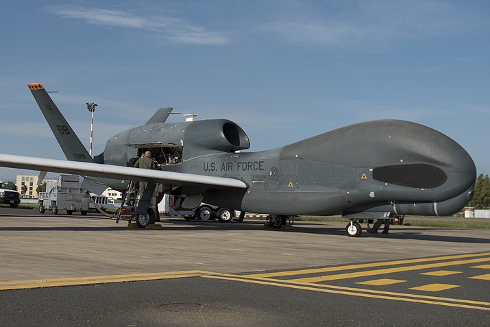 In this Oct. 24, 2018, photo released by the U.S. Air Force, members of the 7th Reconnaissance Squadron prepare to launch an RQ-4 Global Hawk at Naval Air Station Sigonella, Italy. Iran's Revolutionary Guard shot down a U.S. RQ-4 Global Hawk on Thursday, June 20, 2019, amid heightened tensions between Tehran and Washington over its collapsing nuclear deal with world powers, American and Iranian officials said, though they disputed the circumstances of the incident. (Staff Sgt. Ramon A. Adelan/U.S. Air Force via AP)