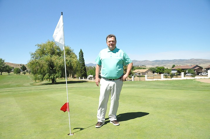 New Prescott Golf Club General Manager Rick Reed, who started working at the course near Dewey on June 17, stands at the ninth hole of the course on June 19. (Doug Cook/Courier)