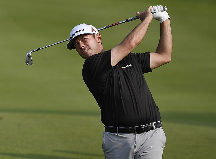 Chez Reavie hits his second shot on the 18th hole during the third round of the Travelers Championship, Saturday, June 22, 2019, in Cromwell, Conn. (Jessica Hill/AP)