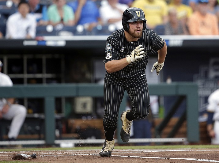 Vanderbilt's Stephen Scott runs off a base hit against Michigan in the second inning of Game 2 of the NCAA College World Series baseball finals in Omaha, Neb., Tuesday, June 25, 2019. (Nati Harnik/AP)