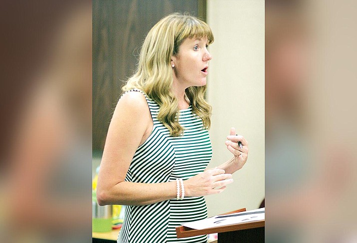 Jamie Woodward, curriculum coordinator for the Cottonwood-Oak Creek School District, explains 2019-2020 Proposition 301 monies to the district’s governing board on Tuesday, June 25. VVN/Bill Helm